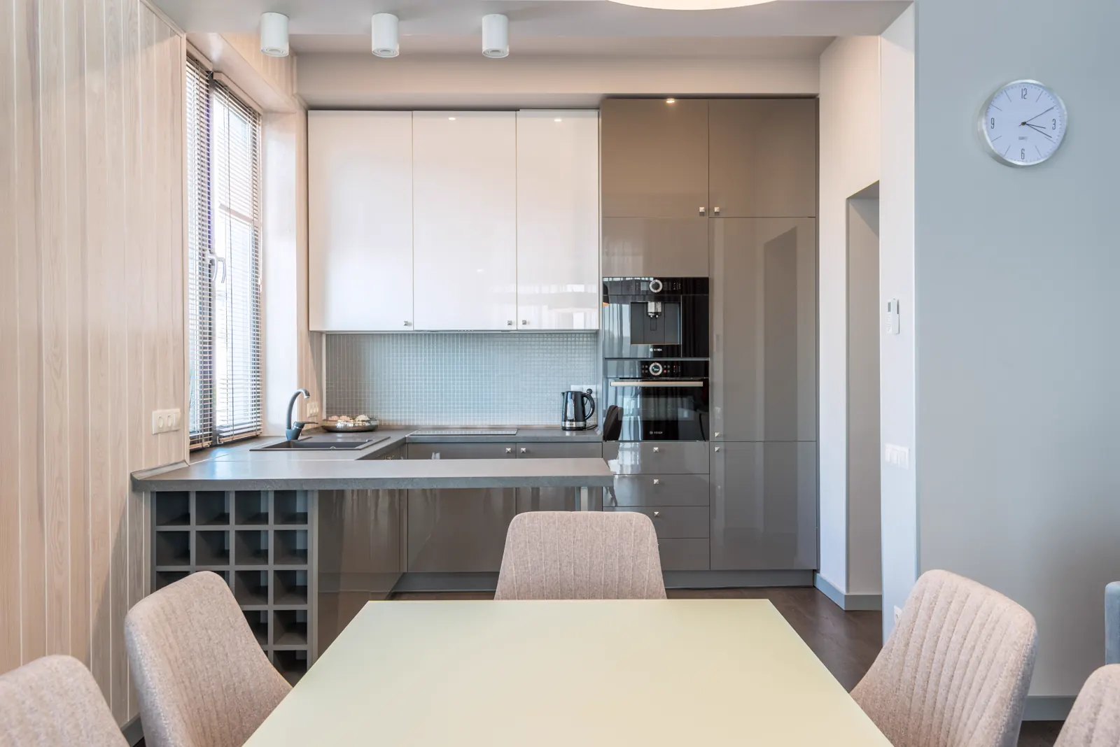 Clean dining and kitchen interior.