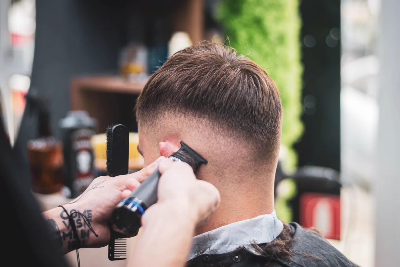 A close detail of hair being prepared