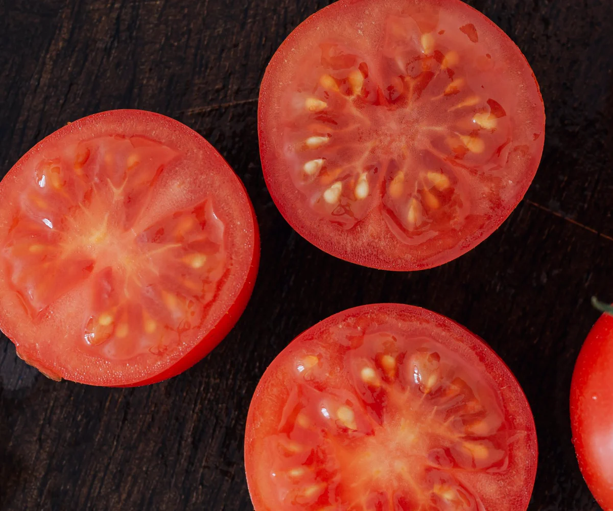 Fresh tomatoes and ingredients for a vegetarian breakfast bap